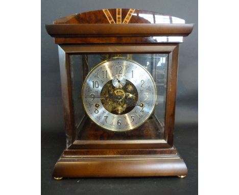 A 20th Century Walnut Cased Musical Mantle Clock, the silvered dial with Arabic numerals and with subsidiary seconds dial and