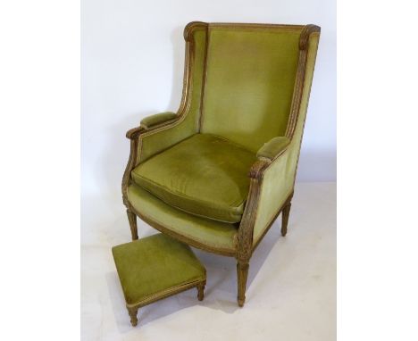 A Late 19th Early 20th Century French Fauteuil with turned tapering reeded legs together with a similar foot stool