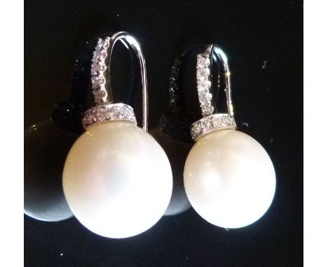 A Pair of 18ct. White Gold Pearl and Diamond Earrings with Large Pearl Drop and with Diamond Set Hoop and Collar
