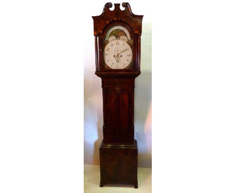 A George IV Mahogany Long Case Clock, the arched hood with swan neck pediments flanked by turned pilasters above a shaped cro