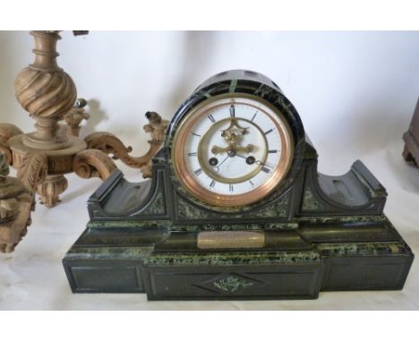 A Victorian Black Slate and Marble Dome Shaped Mantle Clock, the enamel dial with visible escapement and two train movement, 