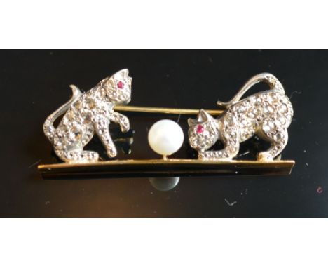 An 18ct. Yellow Gold Diamond Ruby and Pearl Set Brooch in the form of two cats, 4 cms long