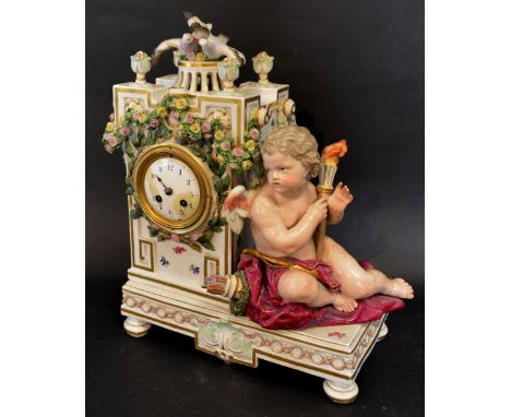 A Late 19th Century Meissen Porcelain Table Clock, surmounted with a figure of Cupid foliate encrusted with bows and swags wi