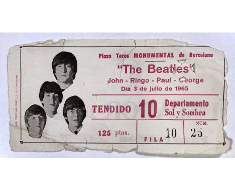 A concert ticket for The Beatles at 'Plaza Toros Monumental De Barcelona' on 3rd July 1965. Measures approx 15 x 7.5cm. Shows