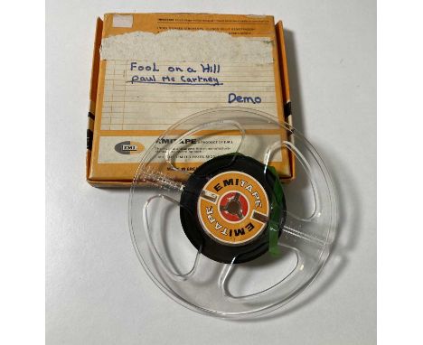 A boxed reel of 5" Emitape containing a demo recording of Paul McCartney's 'Fool On A Hill'. The recording lasts approx 3 min