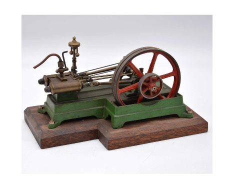 A well-made horizonal steam mill engine, on wooden base, 4inch flywheel, length 20cm.
