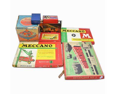 Four Meccano sets, including no. 1 clock-work motor, reversing; gears outfit 'B'; accessory outfit no. 3A; outfit no. 3, all 