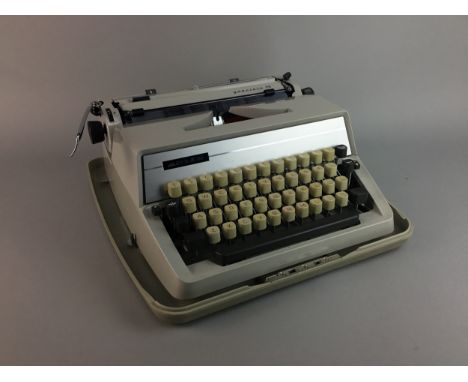 VINTAGE PORTABLE TYPEWRITER, by Adler, 37cm wide