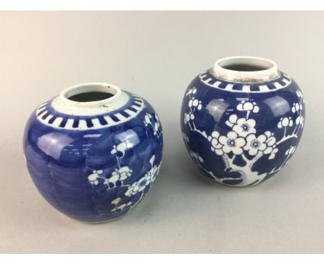 TWO EARLY 20TH CENTURY CHINESE BLUE AND WHITE GINGER JARS, painted with blossom, along with a Chinese blue and white plate, a