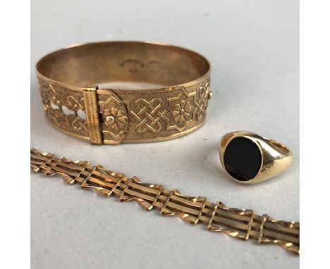 GENTLEMAN'S NINE CARAT GOLD SIGNET RING, along with a nine carat gold bracelet and a gold plated bangle