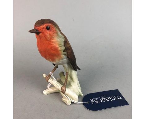 SEVEN VARIOUS HUMMEL FIGURES, including a robin red breast, 13cm high