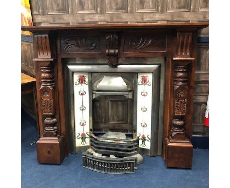 CAST IRON AND CERAMIC TILED FIRE PLACE WITH STAINED WOOD SURROUND