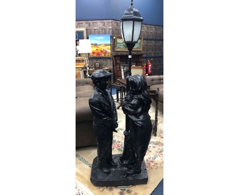 LARGE FIGURE OF A MALE AND FEMALE UNDER A STREET LIGHT, 170cm high