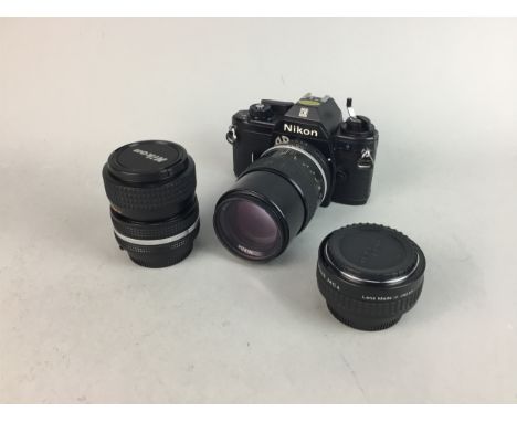 NIKON EM CAMERA, with Nikon Nikkor 135mm 1:3.5 lens and two additional lenses, contained in carry case, along with another ca