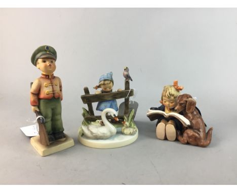 SEVEN VARIOUS HUMMEL FIGURES, tallest figure 15.5cm high
