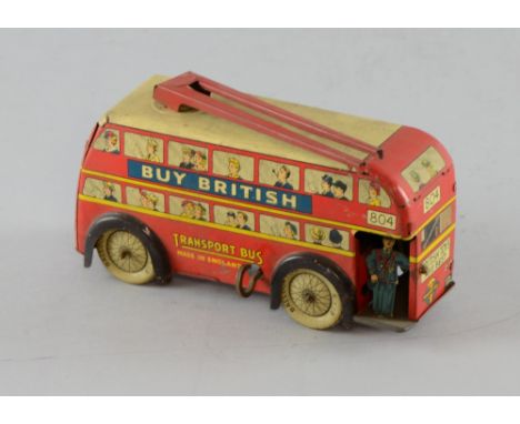 English tin plate clockwork model trolley bus, 17cm long, Heavy play wear. Mechanism rusted.