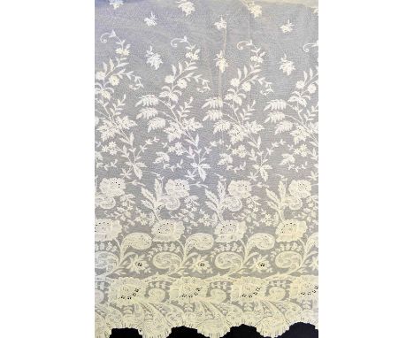 Fine lace dress panel, with naturalistic design of flowering branches hand worked on net, with scalloped border,  France late