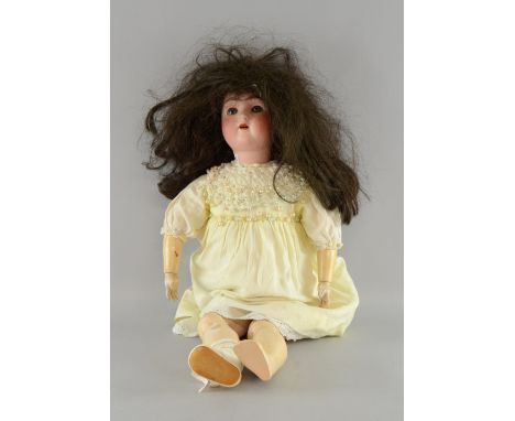 Alt Beck & Gottschalk bisque headed doll, No. 1362, 3 3/4, with brunette wig, blue eyes and open mouth 67cm high, Chips to bi