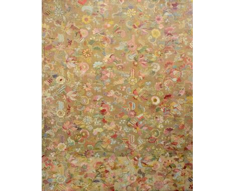 An extensively embroidered panel , worked mainly in silks a detailed floral design, possibly originally a brocaded skirt  pan