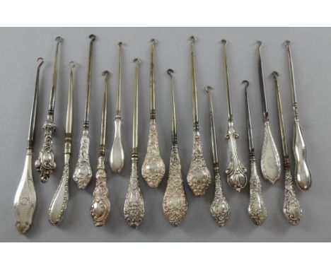 Sixteen Victorian silver handled  button hooks, fifteen with full hallmarks, one marked sterling   