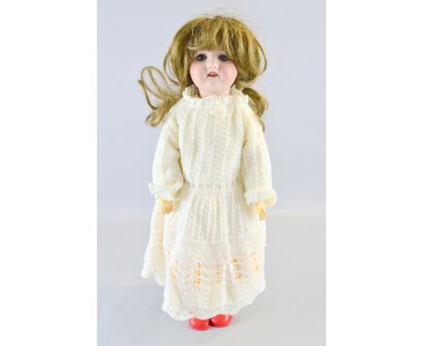 French bisque headed doll S.F.B.J 60 Paris, 42cm, Provenance:  From a single owner collection of over 300 dolls including: Ar