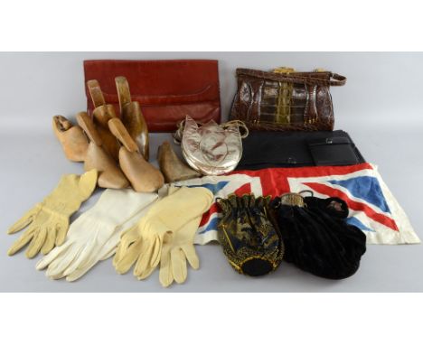 A 1930's crocodile skin handbag and collection of other vintage bags, wooden shoe lasts,  union jack, and gloves  