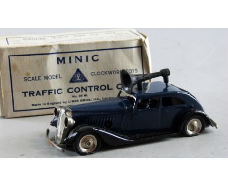 Tri-ang Minic traffic control car in dark blue, single plastic speaker to roof with two figures inside, boxed, Some fatigue t
