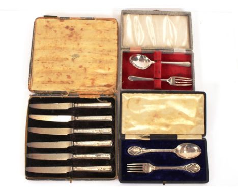 A cased silver Christening fork and spoon, London 1858;&nbsp;another, Birmingham 1959; and a cased set of silver handled frui