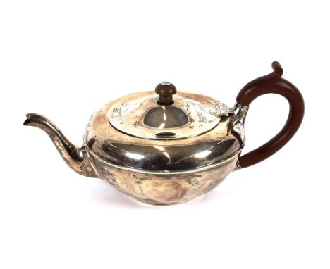 A George V silver cushion shaped teapot, having wooden handle and lift, London 1921, 13ozs. gross