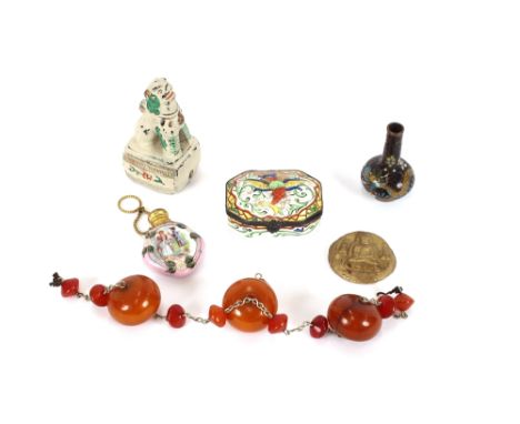 A box of miscellaneous items to include amber coloured beads, small cloissone vase, hinged porcelain box and cover, porcelain