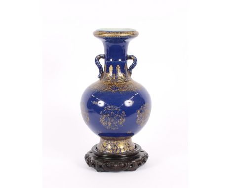 A 19th Century Chinese powder blue and gilt decorated baluster porcelain vase, having flared neck, Chien Lung seal mark to ba