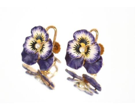 A pair of yellow metal ear-rings, with enamel floral decoration and central seed pearl, marked 14 carat