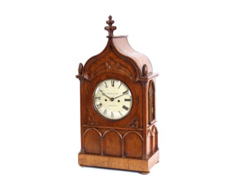 A Victorian oak bracket clock, of Gothic design, by Joseph King &amp; Son, Tunbridge Wells, 8 day fuse movement striking on a