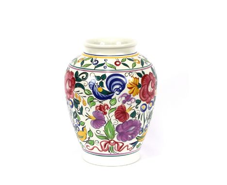 A large and colourful Poole pottery baluster vase, decorated with birds and flowers, impressed Poole, England and A.W. mark t