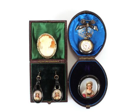 A late 19th Century portrait&nbsp;decorated brooch and ear-ring set; an oval white metal Cameo brooch and a gun metal ladies 