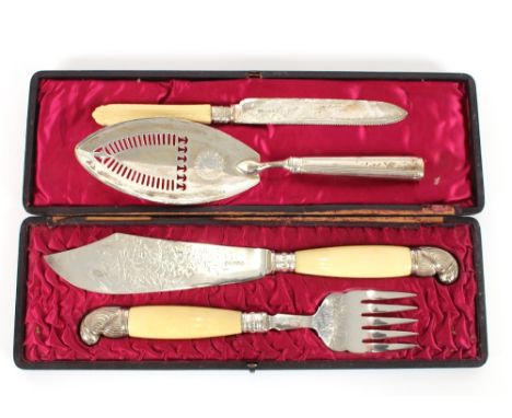 A pair of cased plated fish servers, with ivory handles; a silver cake fork; and a George III silver fish slice, London 1795,