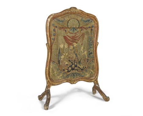 Pare-feu de forme mouvementée en bois doré d'époque Louis XVA décor mouluré et sculpté de fleurettes et rinceaux feuillagés, 