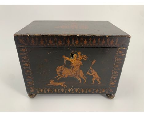 An early 19th century hand decorated and lacquered caddy on repousse brass feet.16 W.20 D.13cm 