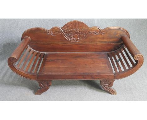 A carved Javanese hardwood canape sofa. H.80 W.150 D.54cm. 