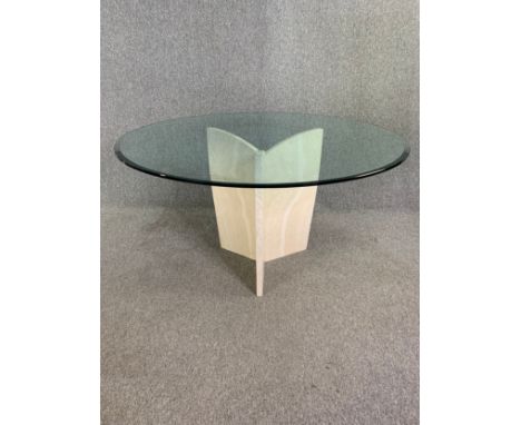 A vintage Italian Artelano dining table with plate glass top on travertine marble base. H.74 Dia.130cm