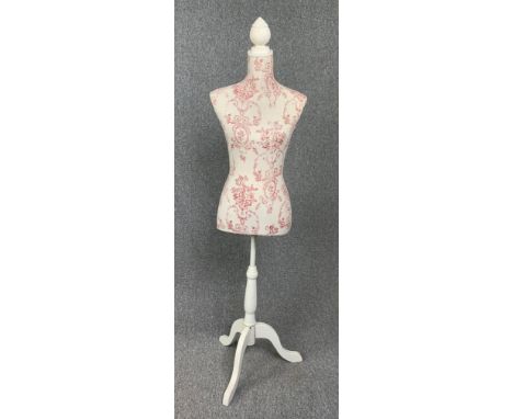 A vintage style mannequin on stand. H.148cm 