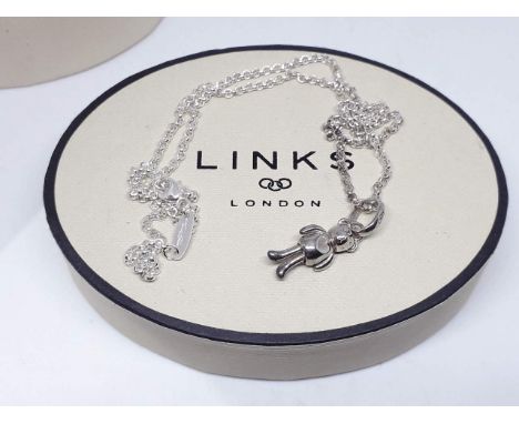 A Links of London teddy bear pendant on Thomas Sabo chain, both marked '925', with box. 