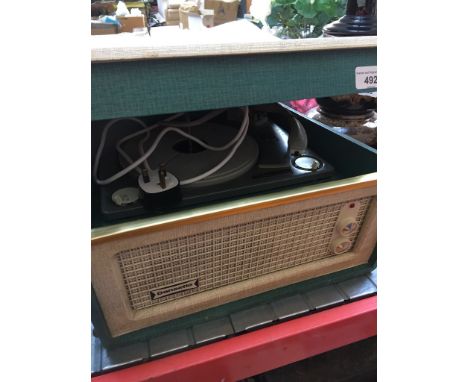 A vintage Dansette portable record playerCondition:- General wear through age and use, small rip in bacl of unit, no signs of