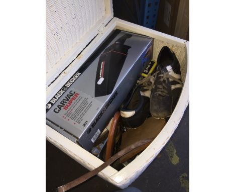 A laundry basket with contents to include CDs, hair dryer, projector, some hardware, 35mm camera, platedware, car vac, etc. 