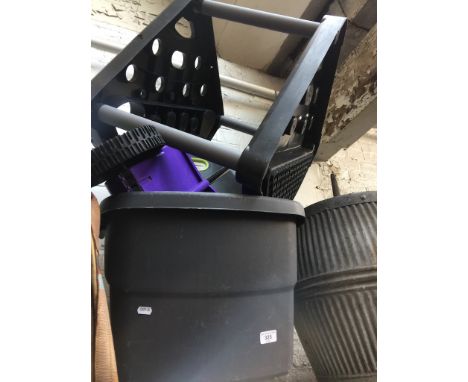 A Westland garden spreader, a garden tool organiser, a Keter garden cart and a slug trap 