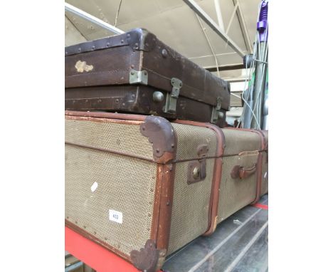 A cabin trunk and a suitcase. 