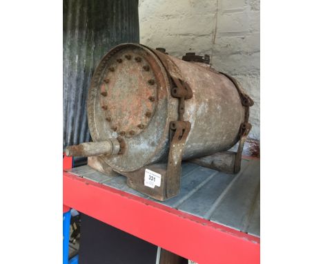 A vintage riveted fuel tank 