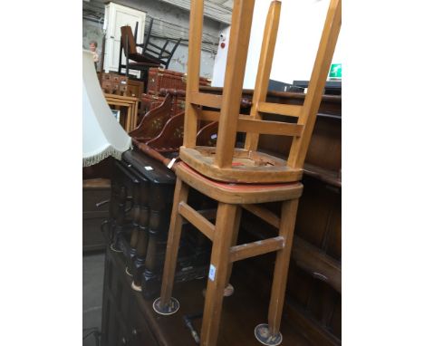 A pair of light wood stools 