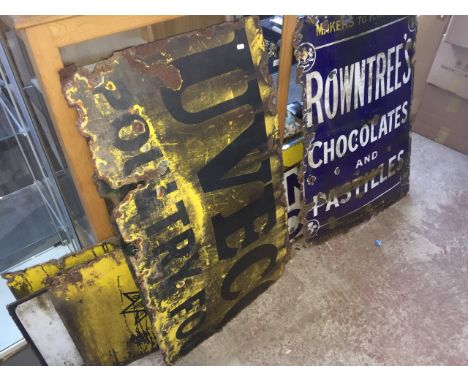 A collection of enamel signs including Rowntree, all as found. 