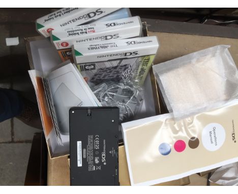 A Nintendo DS + manual and games. 